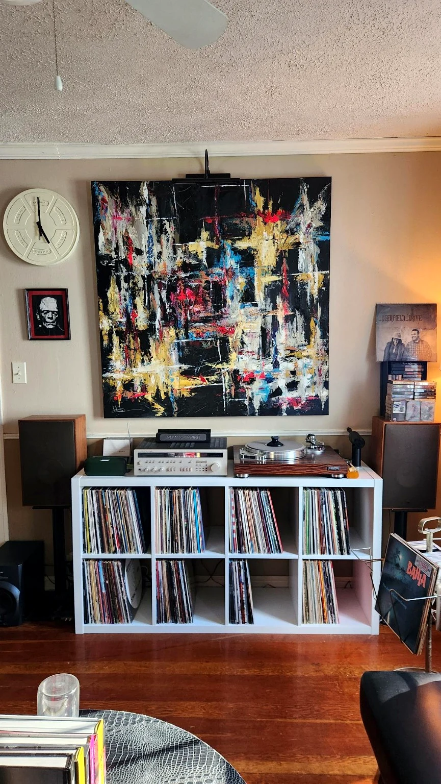 Vinyl record storage, turntable and abstract artwork